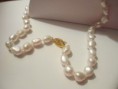 Genuine pearl necklace with 14k clasp